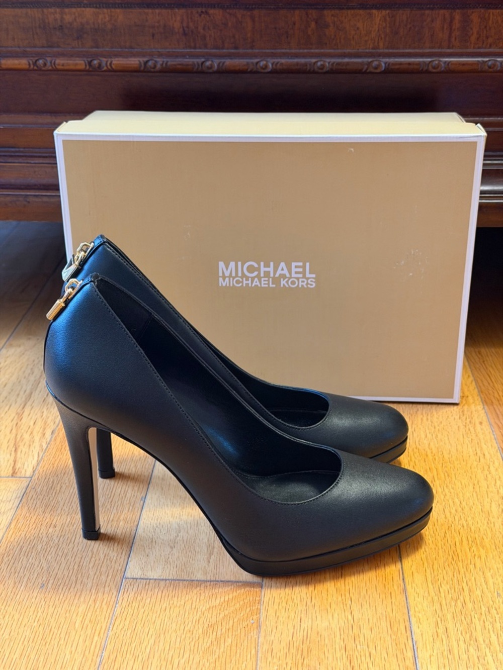 MICHAEL Michael Kors Black Leather Platform Pumps with Gold Accent